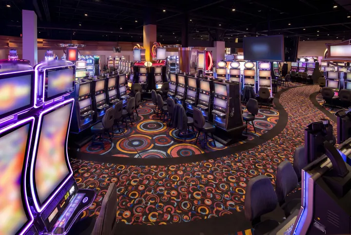 Curving rows of slot machines late at night