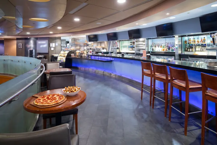 Pizza and poutine at the empty Bar and Grill